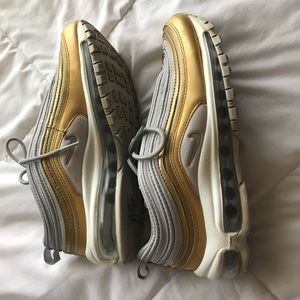 Silver and gold air max 97 size 7.